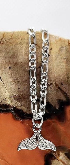 Whale charm on stainless steel figaro chain